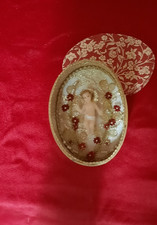 Wachskindl in Spandose